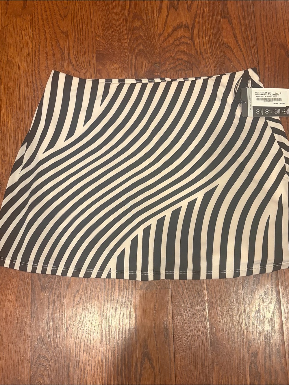 TAIL Black and Cream Striped Women’s Mini athletic tennis/ pickleball Skort. NWT